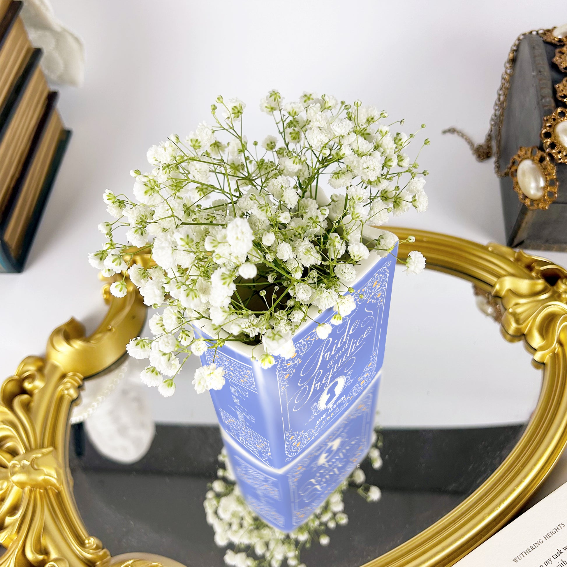d74e72ff-e4cb-4c92-b461-166947feafc5/Pride_and_Prejudice_II_-_Ceramic_book_vase_-_size_small_-mockup_IMG_5687.jpg