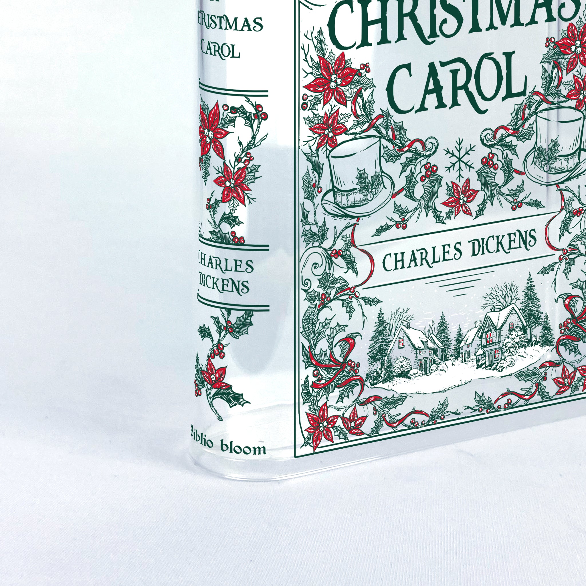 Acrylic book vase styled as 'A Christmas Carol' with festive red and green design