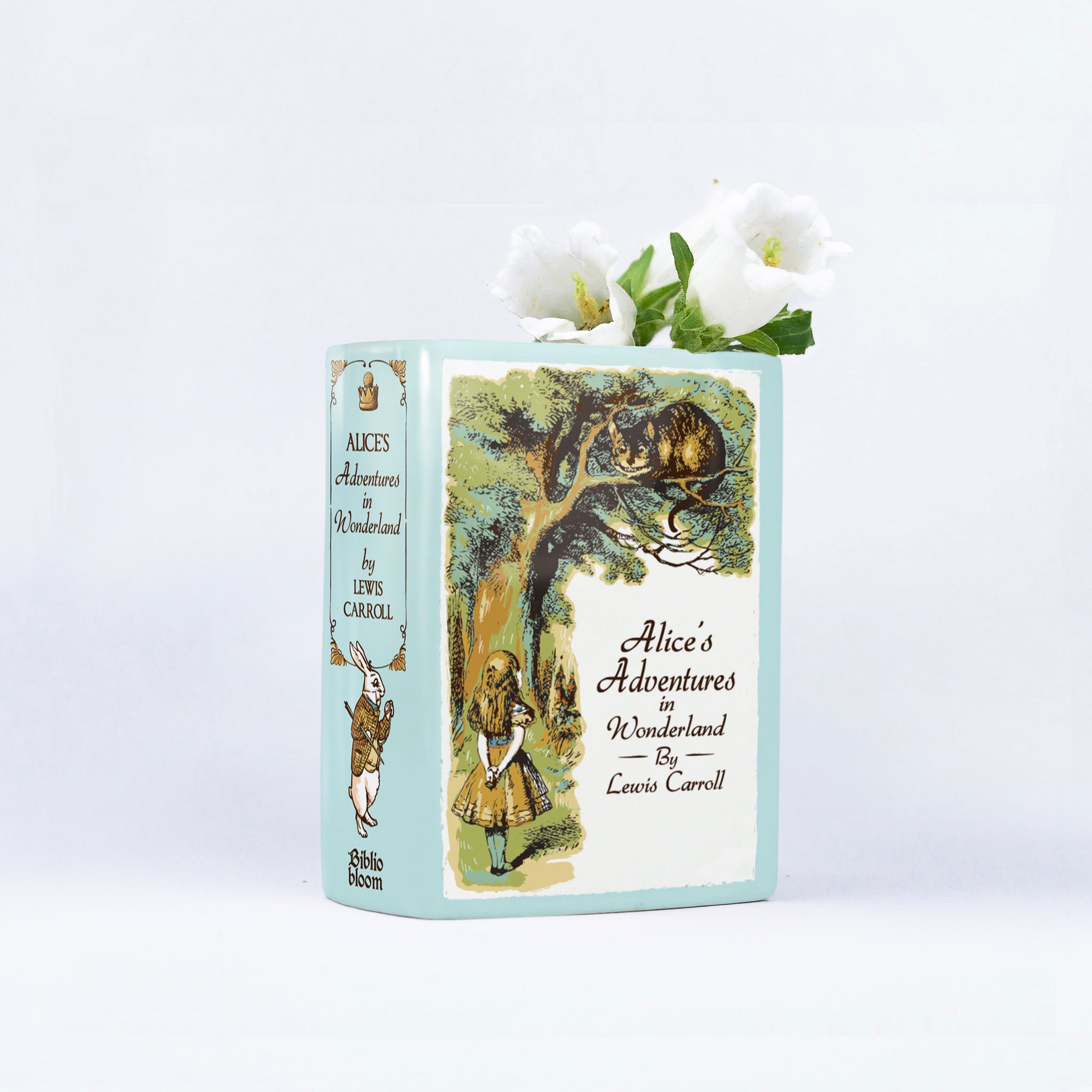 832a994f-7755-49f9-8bb9-792dd8e90fe6/Alice_s_Adventures_in_Wonderland_Ceramic_Book_Vase_-_size_small_-_mockup_hoa_t_i.jpg