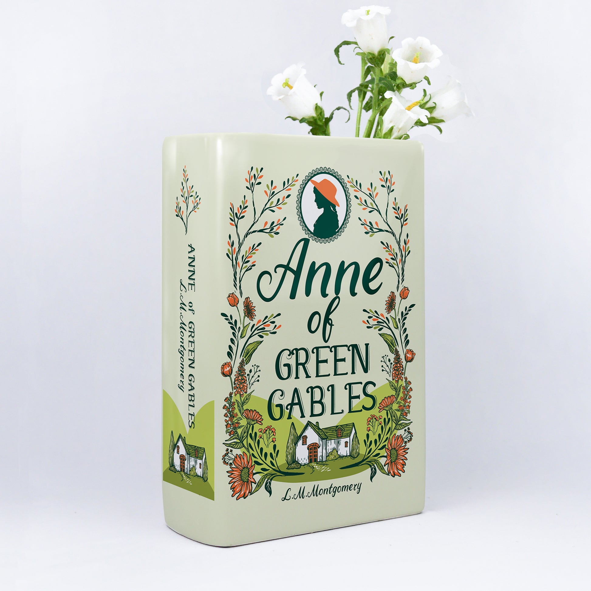 b450f12f-2c57-451c-bab3-63dc43e6ea26/Anne_of_Green_Gables_-_Ceramic_Book_Vase_-_mockup_hoa_t_i.jpg