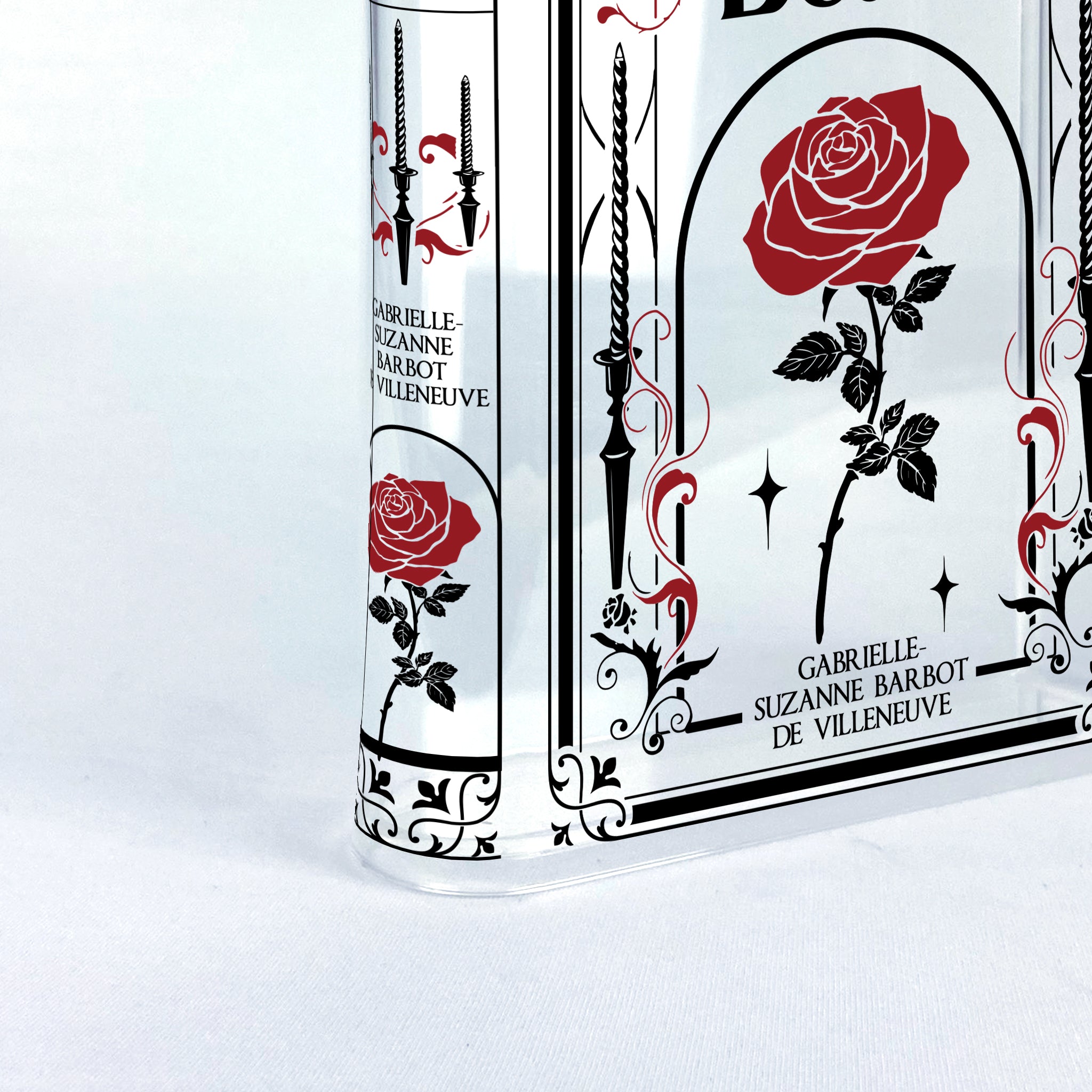 Acrylic book vase with red rose and sword design, Beauty and the Beast cover art.