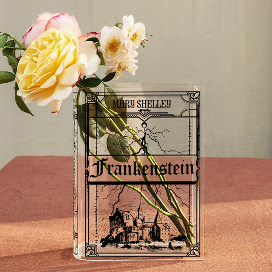 Frankenstein acrylic book vase with flowers on table, decorative literary home decor