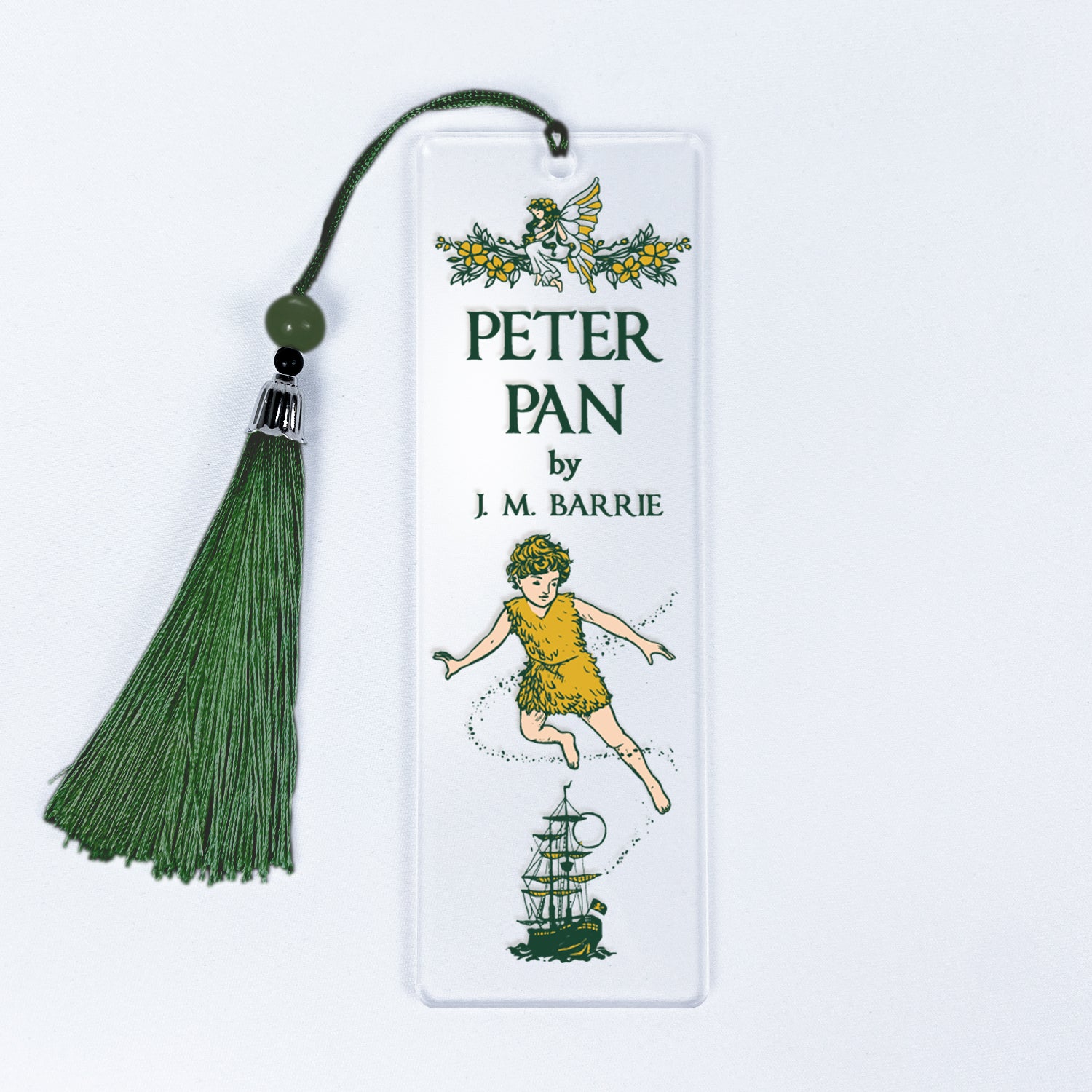 Peter Pan bookmark with green tassel, fairy, ship, and character illustration on white background