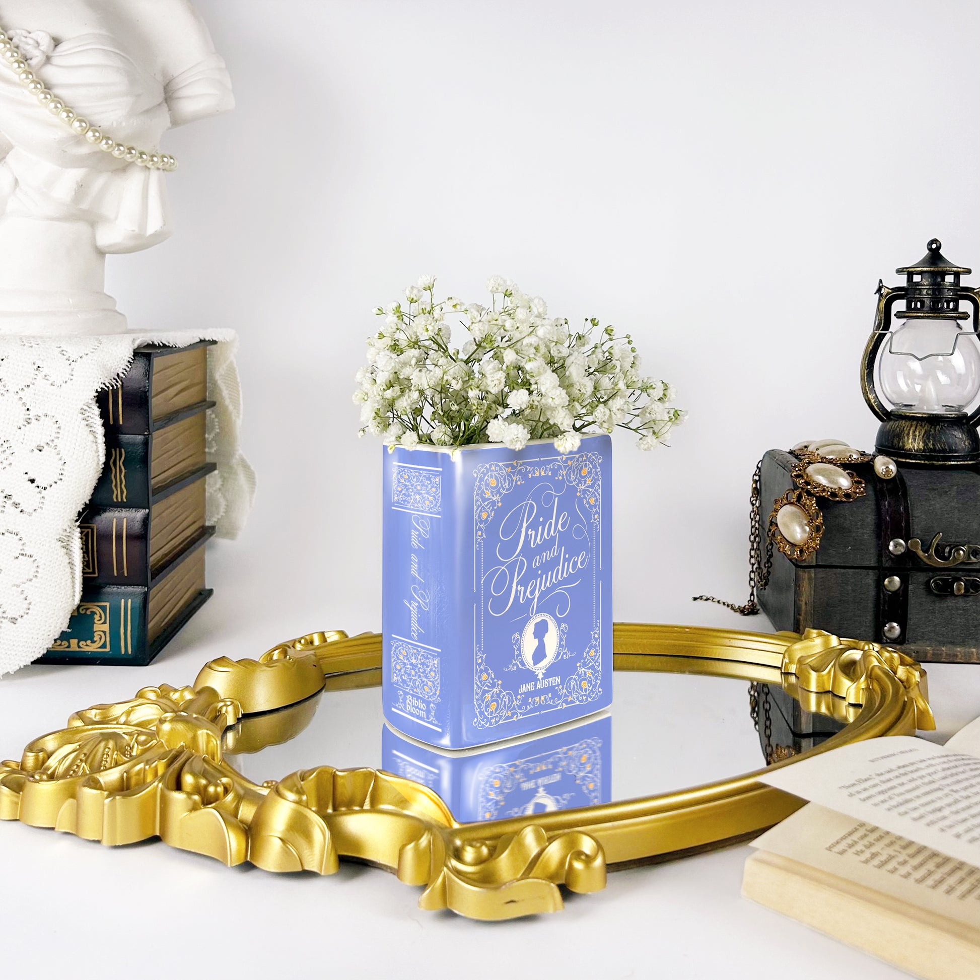 61778f62-3166-428c-90af-f355df0687c6/Pride_and_Prejudice_II_-_Ceramic_book_vase_-_size_small_-mockup_IMG_5669.jpg