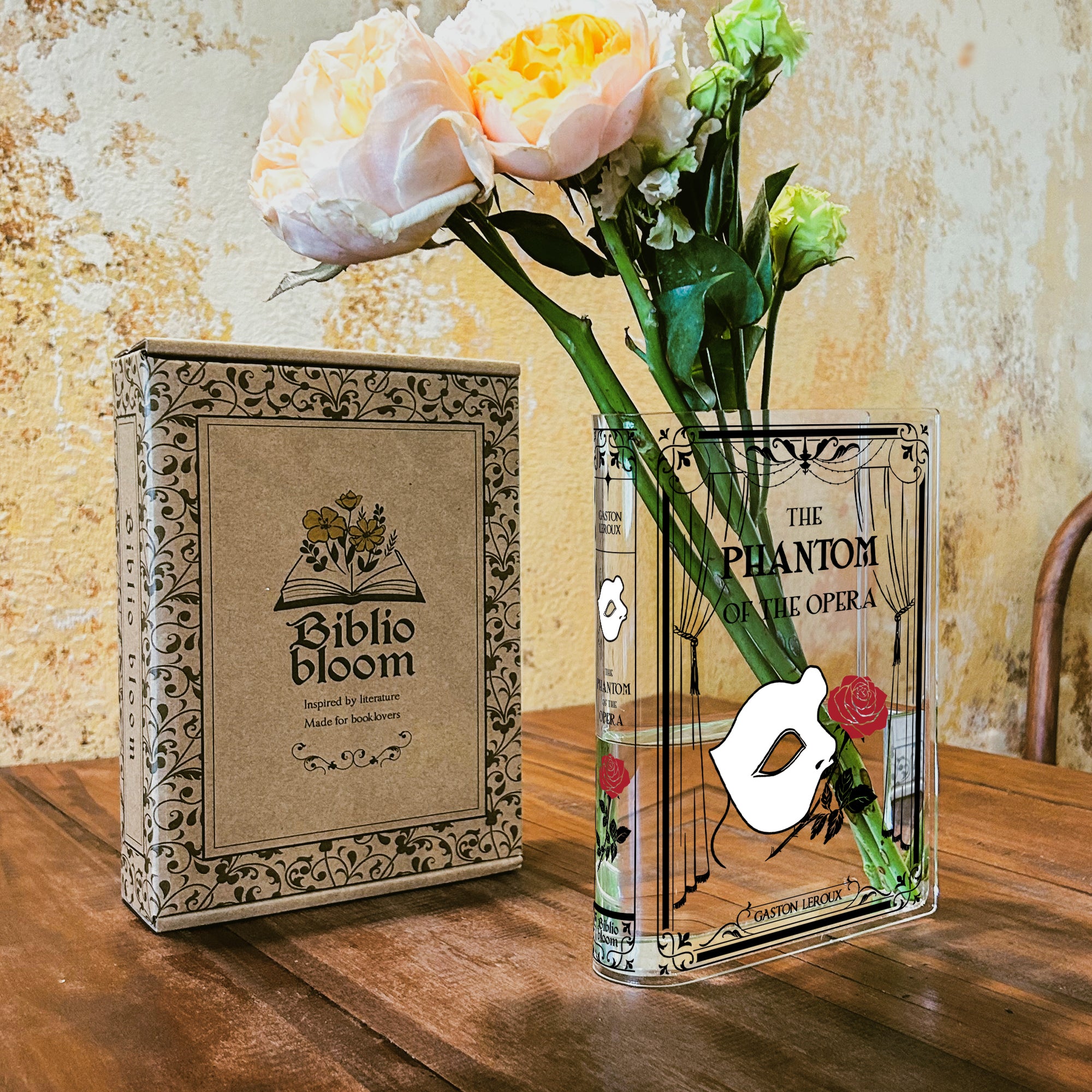 The Phantom of the Opera acrylic book vase with roses, Biblio Bloom box on wooden table