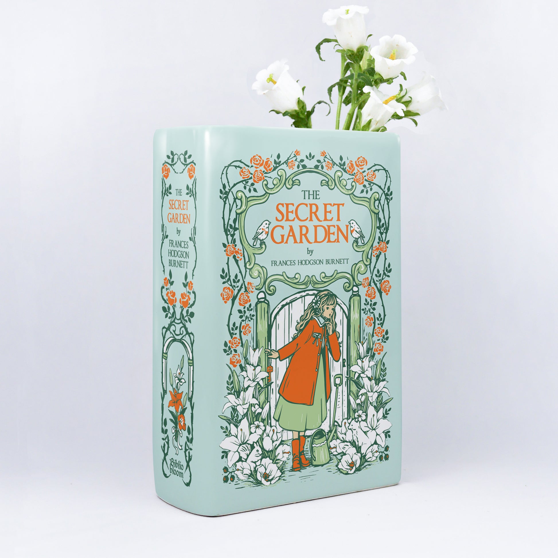 9f9e8344-1143-4cee-b8d5-6e9d61821a55/The_Secret_Garden_-_Ceramic_Book_Vase_-_mockup_hoa_t_i.jpg