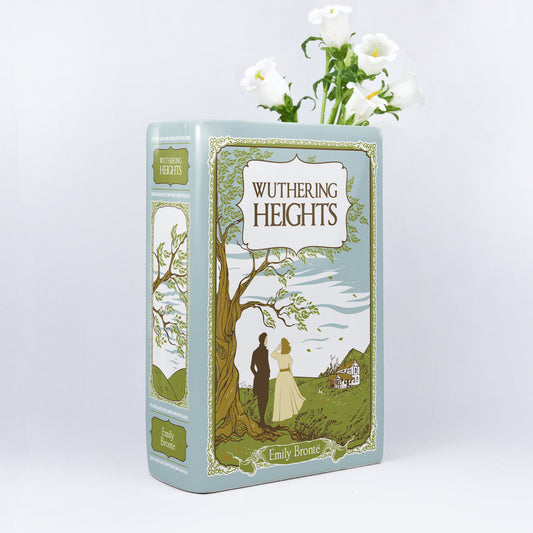 Ceramic book vase shaped like Wuthering Heights with white flowers, book decor