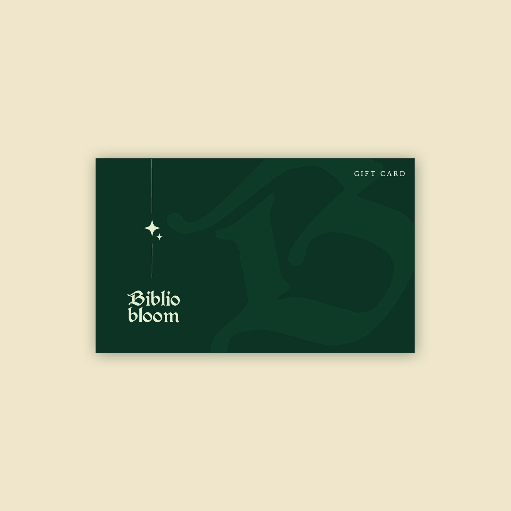 Biblio Bloom gift card with dark green design and star accents on a cream background