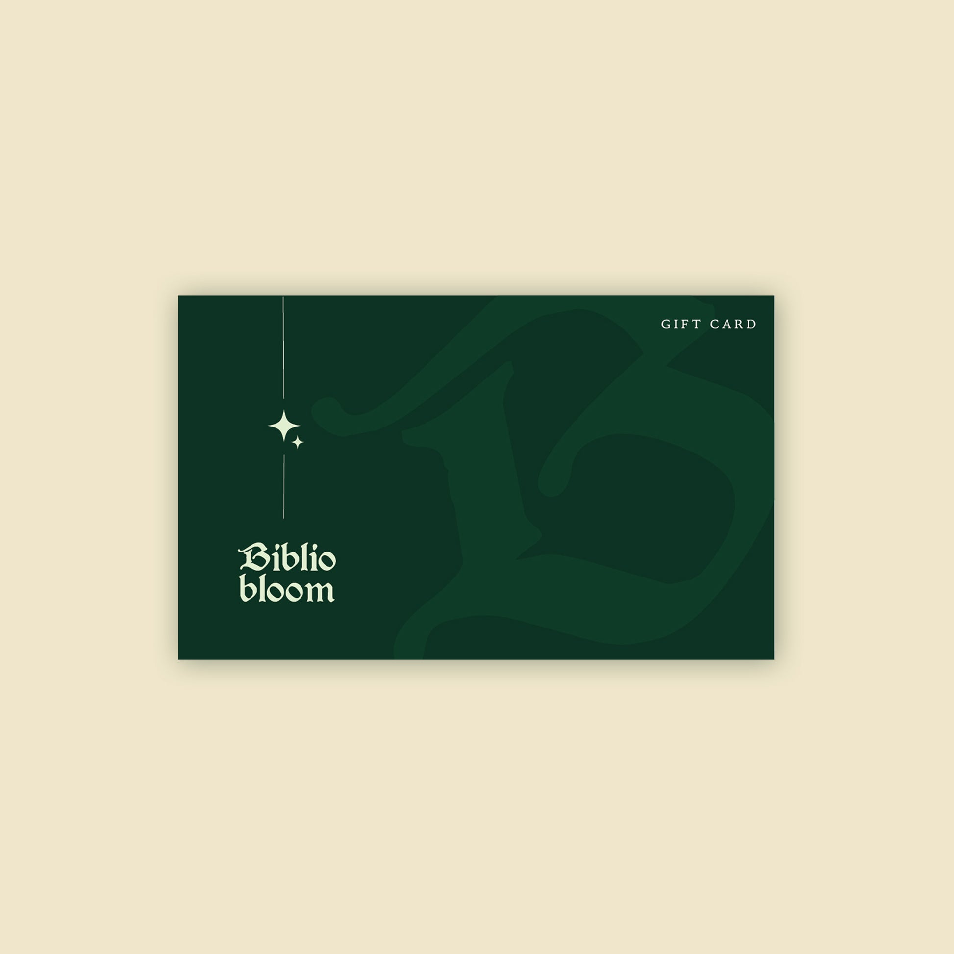Biblio Bloom gift card with dark green design and star accents on a cream background