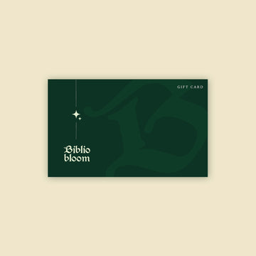 Biblio Bloom gift card with dark green design and star accents on a cream background